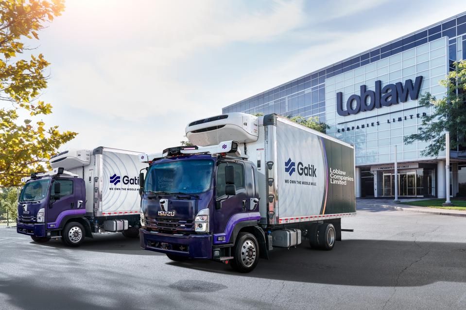 Gatik autonomous trucks outside a Loblaw retail loction. 
