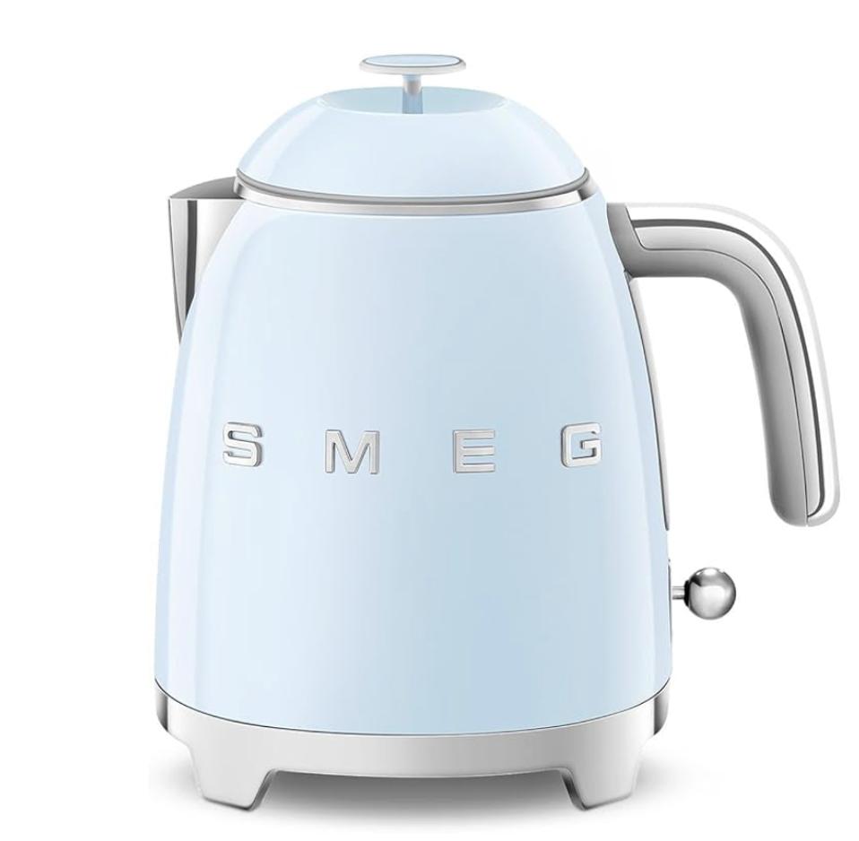 SMEG Mini 50's Retro Style 3 Cup Electric Kettle in cream on a white background