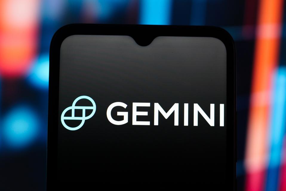 In this photo illustration, the Gemini Space Station logo is...