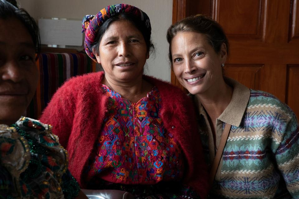 Christy Turlington Burns greets traditional midwife Angela Delgado during her trip to Guatemala. 