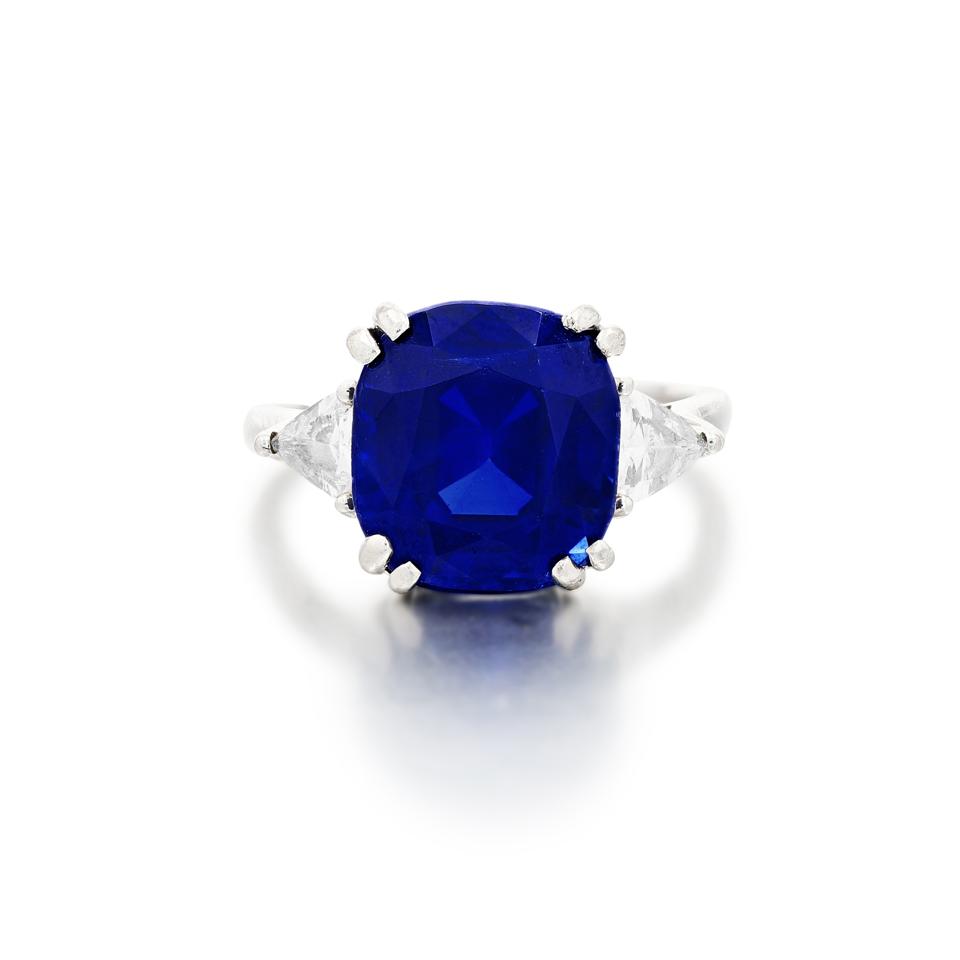 10.68-carat Kashmir sapphire ring flanked by diamonds. Estimate: $257,455 – $327,671