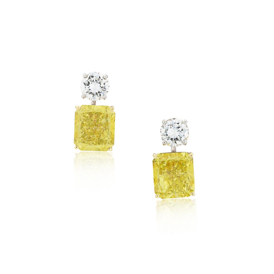 Fancy intense yellow diamond earrings by Graff. Estimate: $210,645 - $327,671
