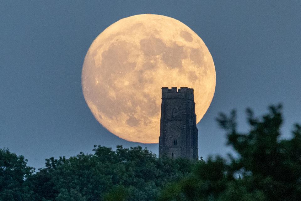 Harvest Supermoon Rises Over Glastonbury Tor