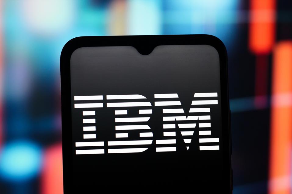 In this photo illustration, the IBM (International Business...