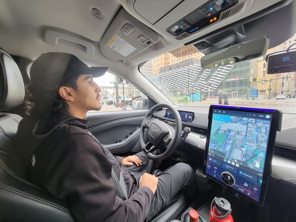 The person in the driver's seat spent most of the with his hands off the steering wheel.