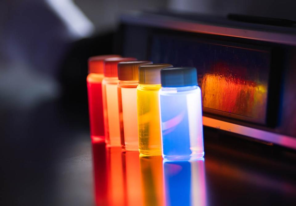 UbiQD-Quantum dots glowing with various colors in vials