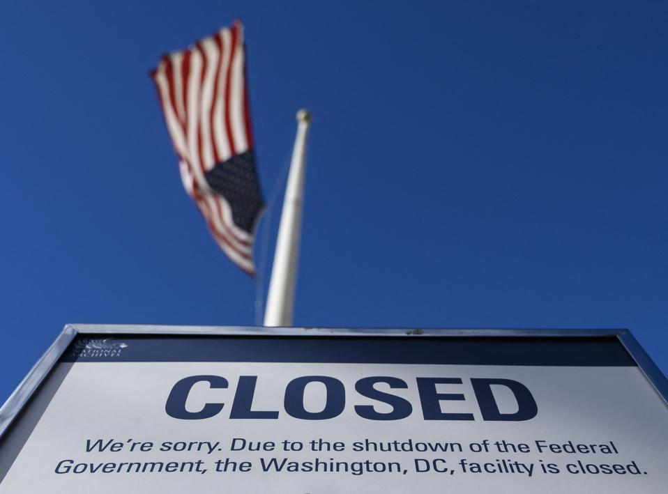 “Closed due to the shutdown of the Federal Government” in front of a U.S. flag, symbolizing the career uncertainty facing mission-driven federal employees.
