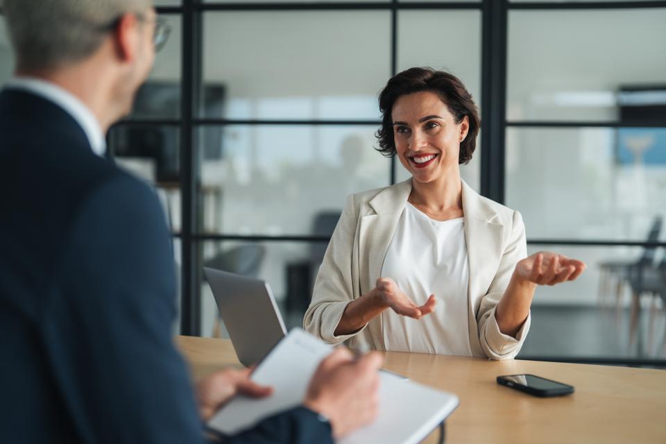 Insight-driven business dialogue. Confident businesswoman engaging in professional discussion