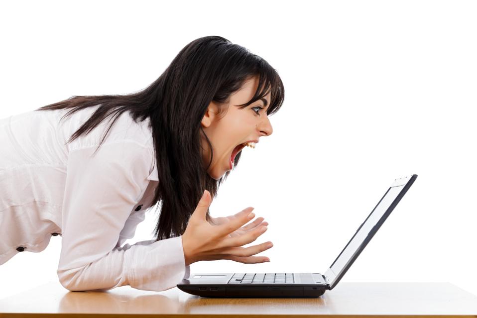 A user frustrated by technology, representing the feeling of dealing with ChatGPT's endless conversations.
