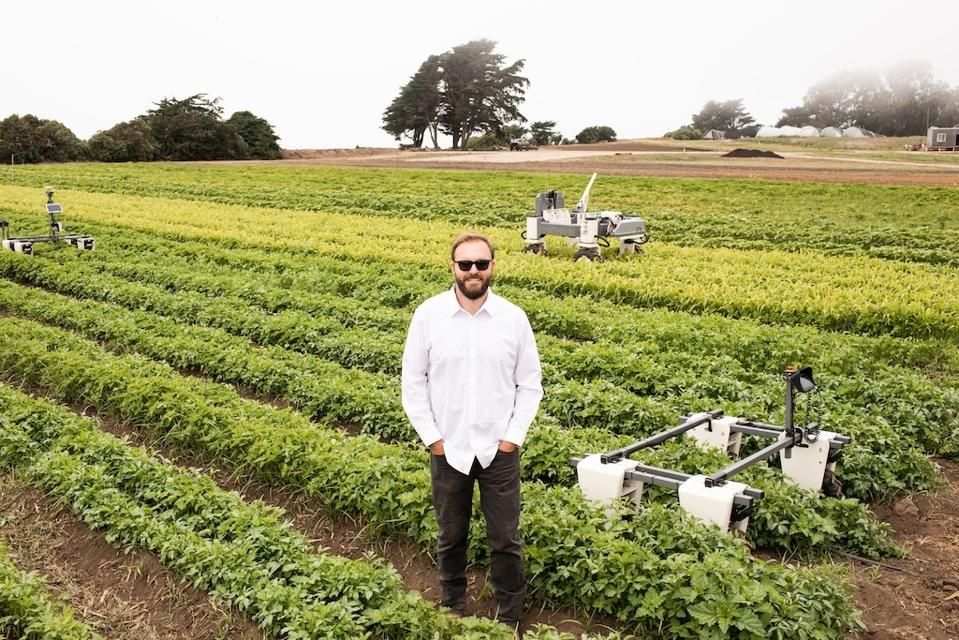 Tyler Niday CEO in field with Amigas