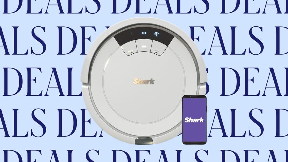 A light gray Shark robot vacuum on a light blue background with the word "deals" repeated. 