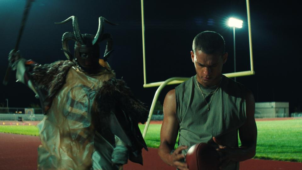 Horned Fanatic (Maurice Greene) and Cam (Tyriq Withers) in HIM