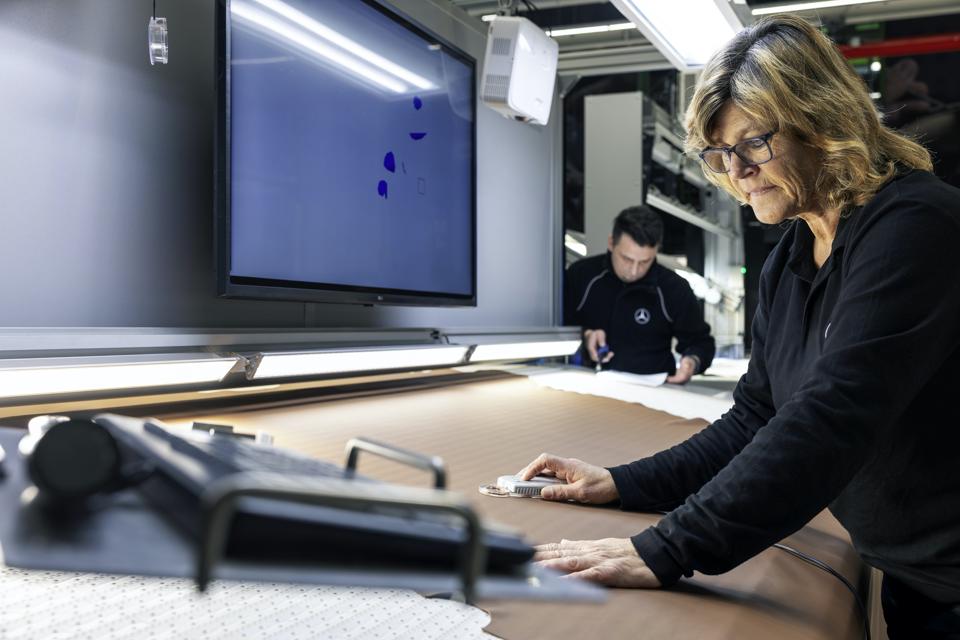 Digital scans are performed on leather hides to identify any blemish. 