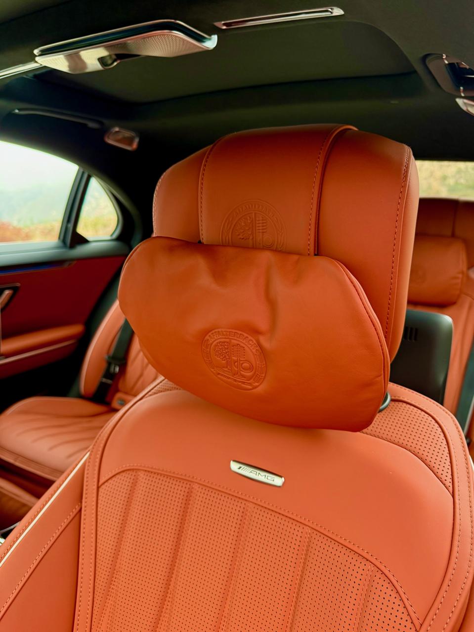 Headrest pillows with embossed AMG logo.