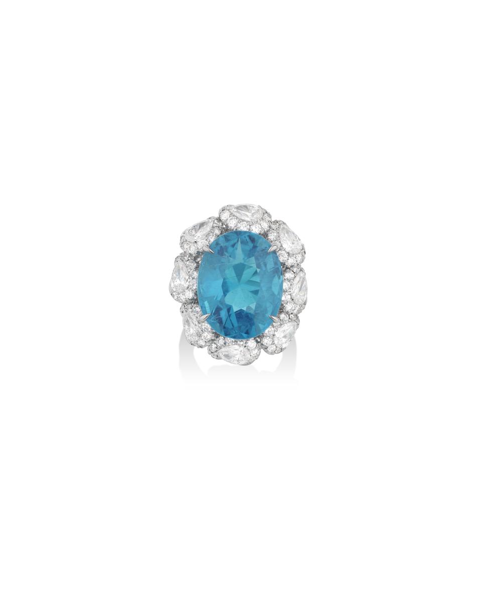 A diamond ring set with a 20.08-carat oval Paraiba tourmaline. Estimate: $250,000-$350,000