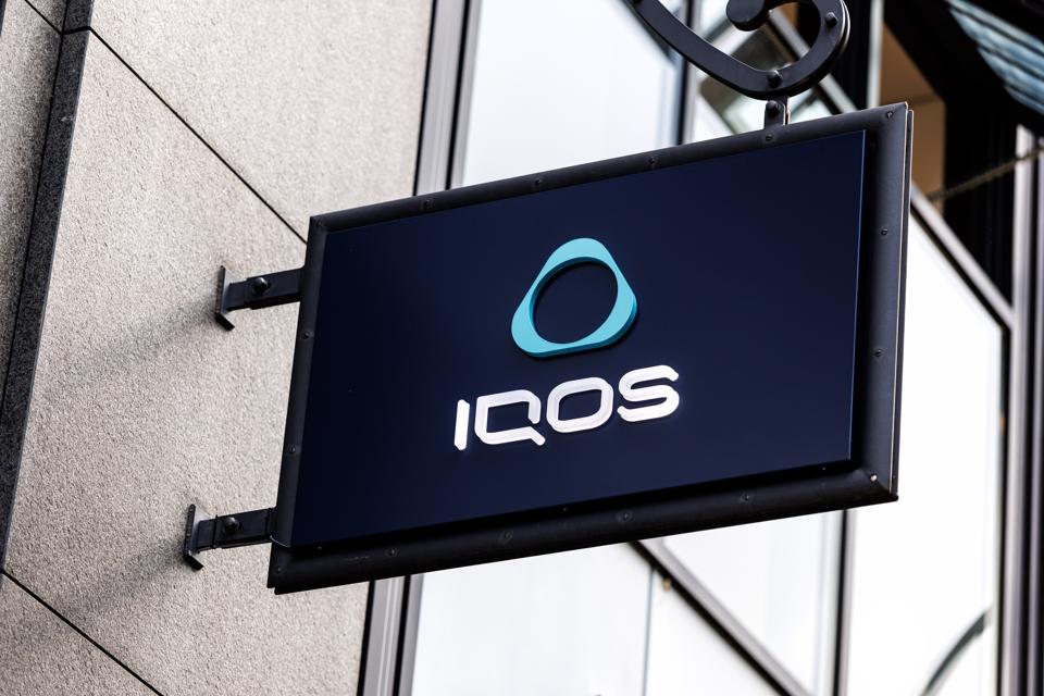 Iqos brand logo on a store