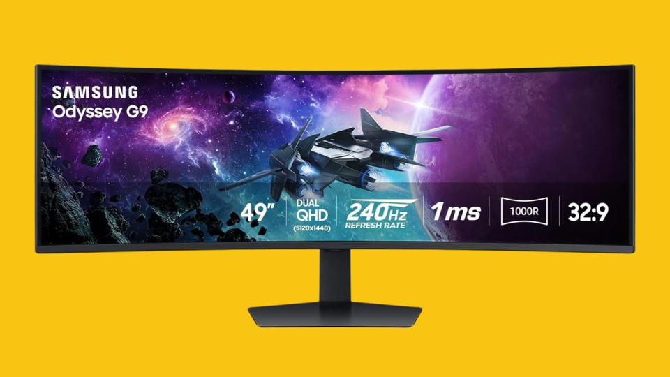 Samsung ultrawide monitor on a yellow background.
