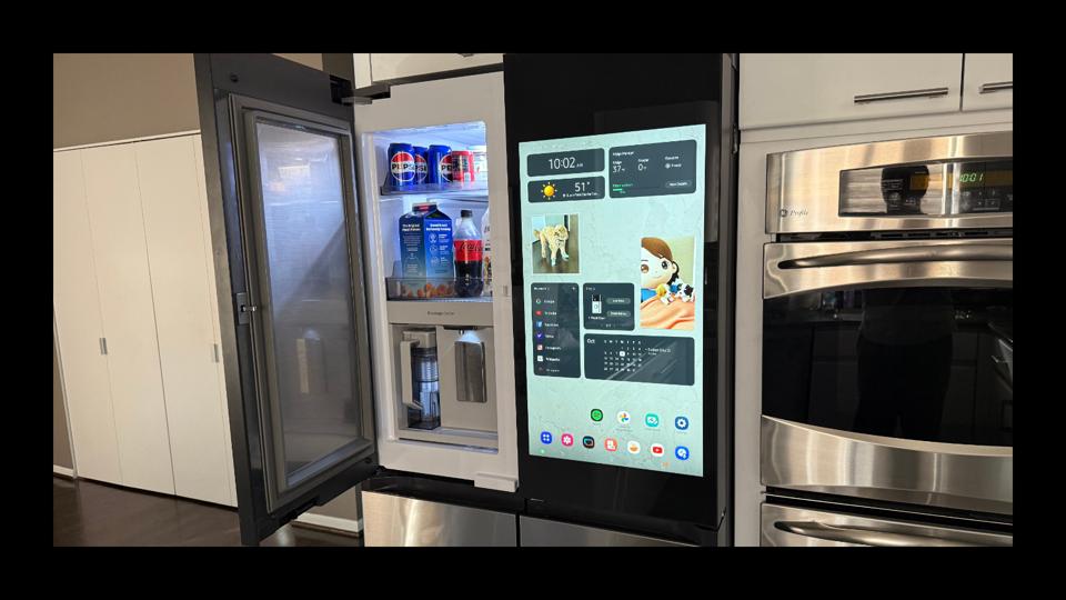 Samsung Bespoke AI 4-Door Flex Fridge with left door open showing beverage center