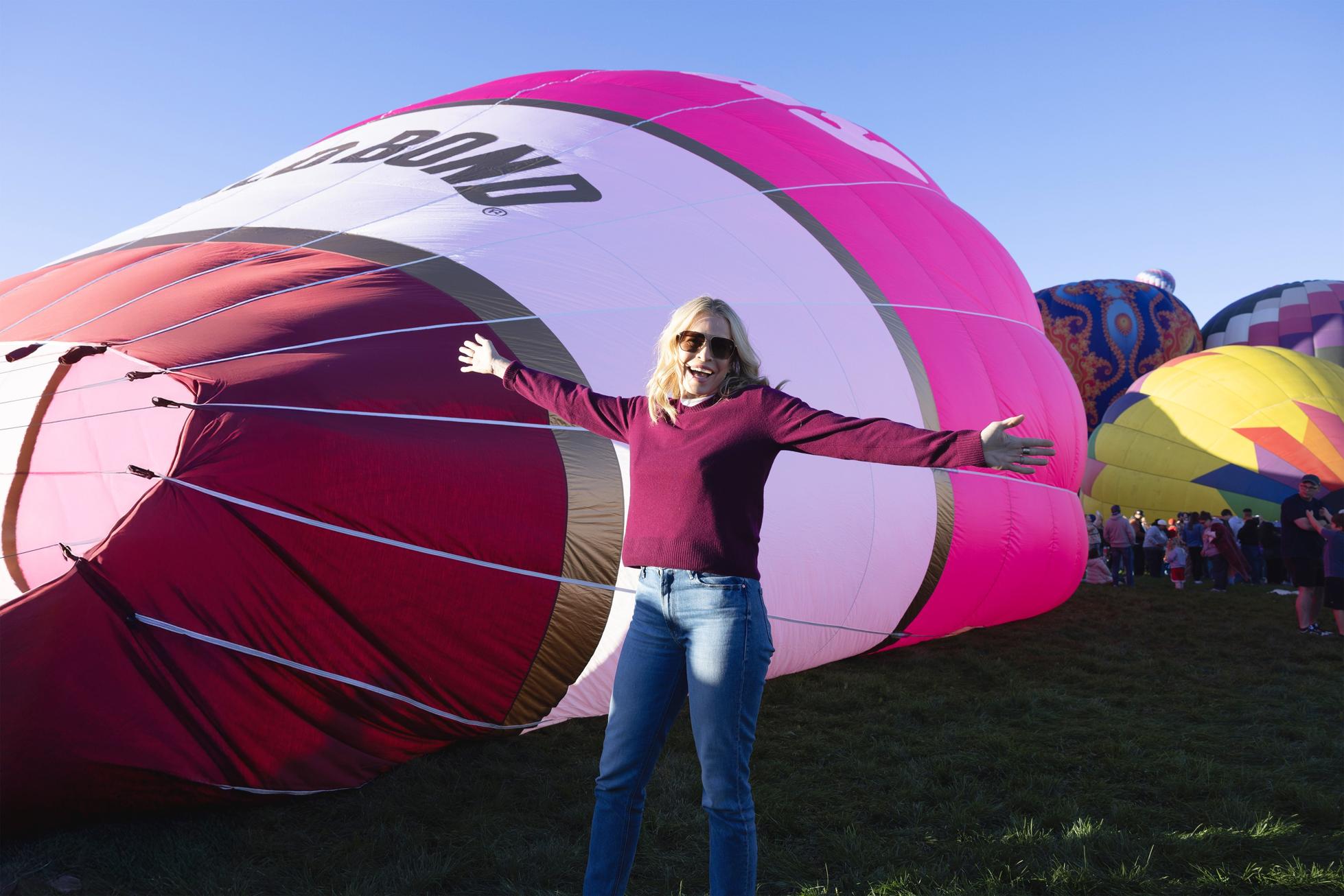 Handler in front of the custom Gold Bond hot air balloon