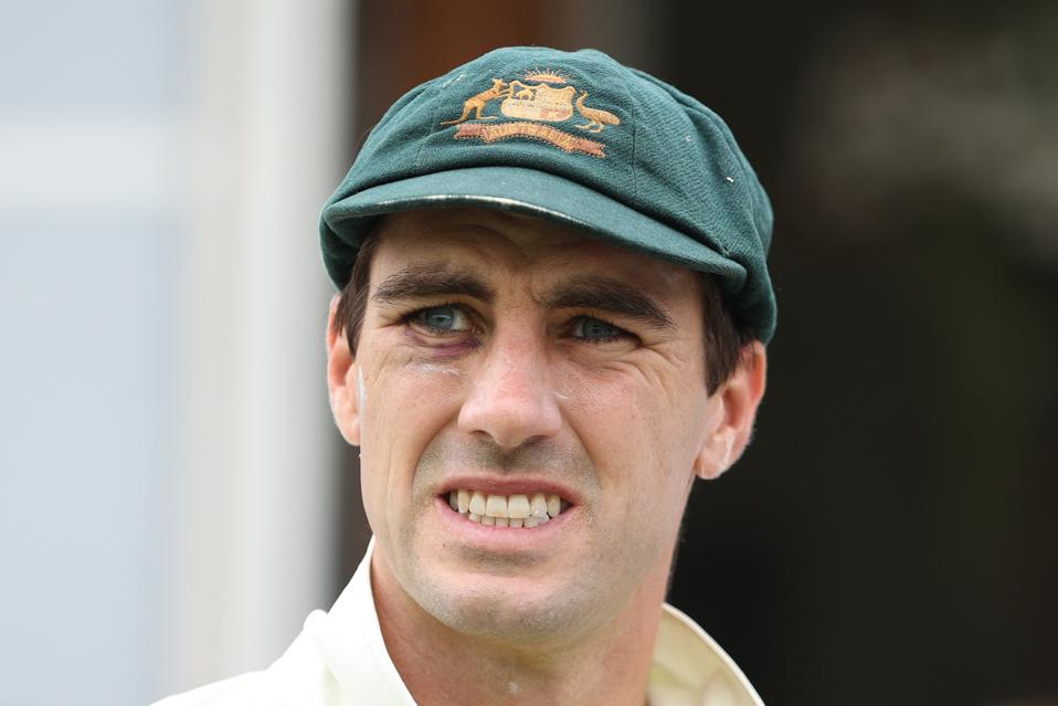 Pat Cummins grimaces after being hit by the ball at Lord's in the 2023 Ashes Test.