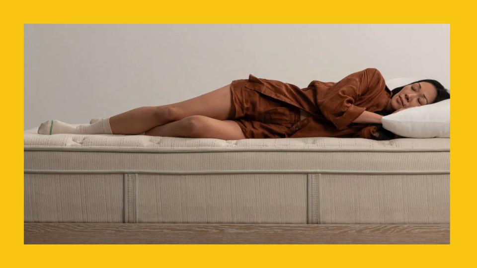 Woman sleeping on the Leesa Natural Hybrid Mattress.