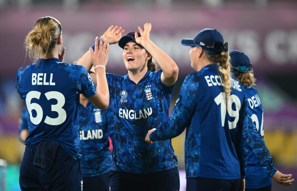 Natalie Sciver-Brunt thanks Lauren Bell during England's World Cup win over Bangladesh.