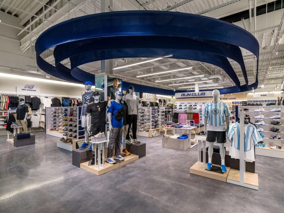 Champs Sports' redesigned store concept is modern and sleek.