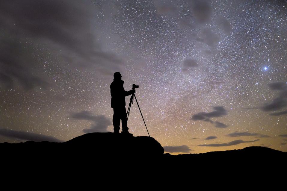 Silhouette of Photographer at Night