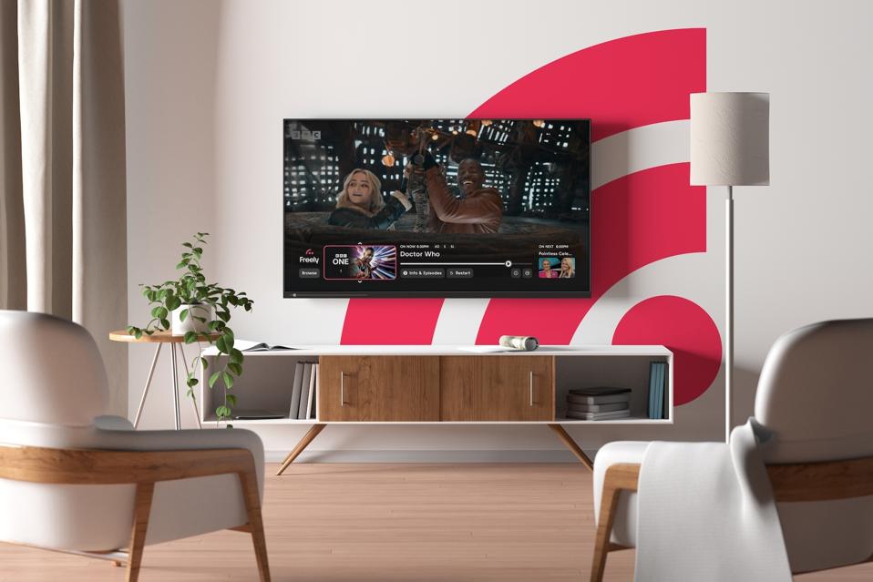 TV screen on the white wall in modern living room.