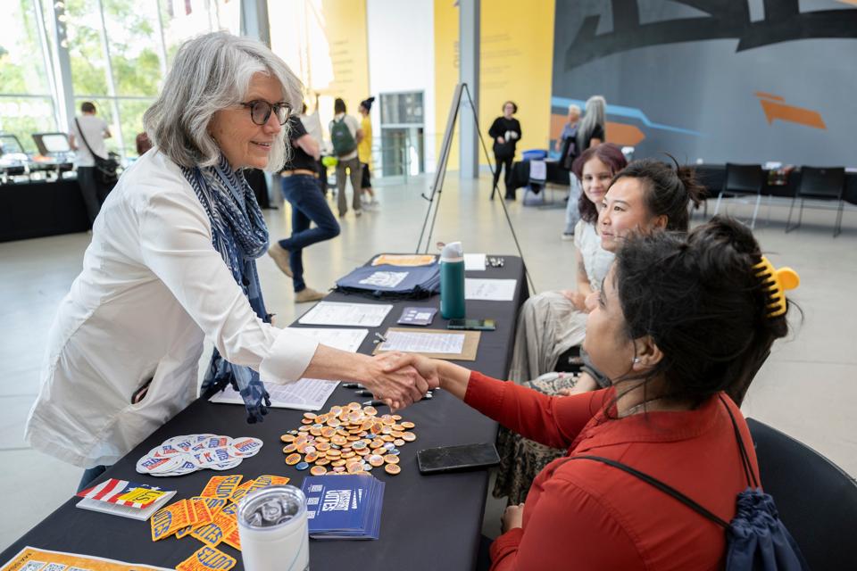 President Mary Grant speaking with students at Constitution Day