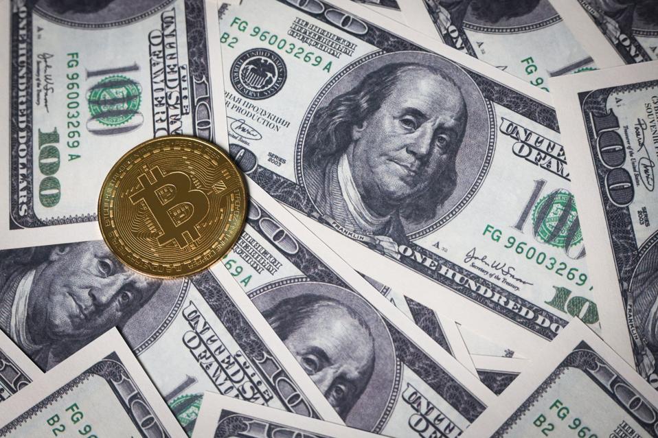 In this photo illustration, the new Bitcoin token is...