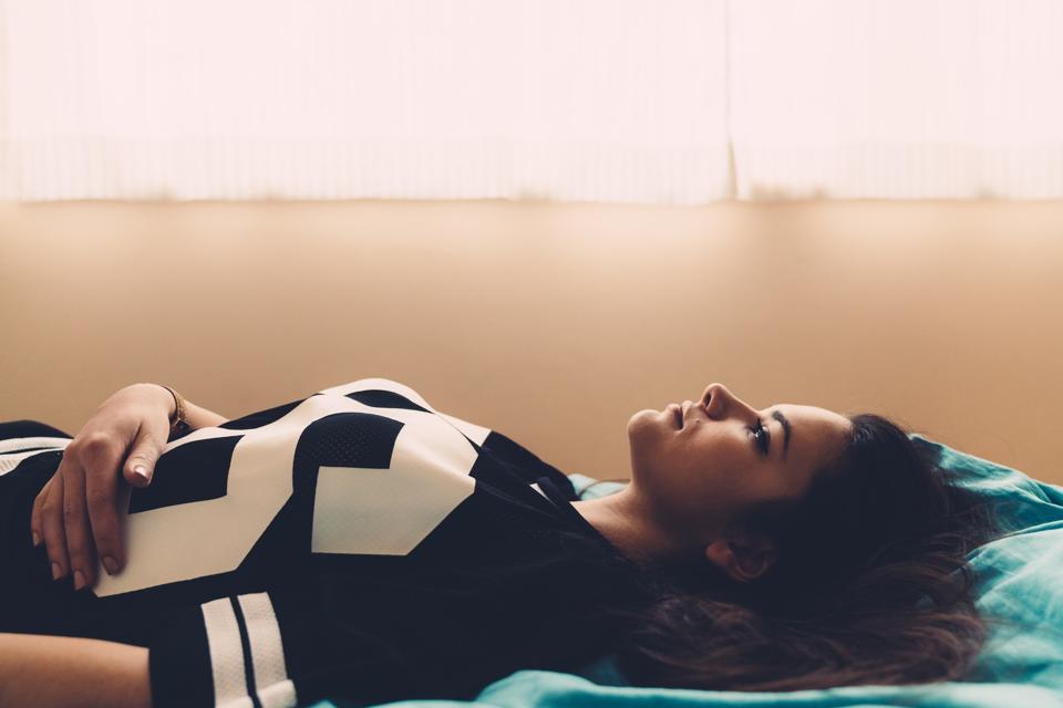 Young woman lying down