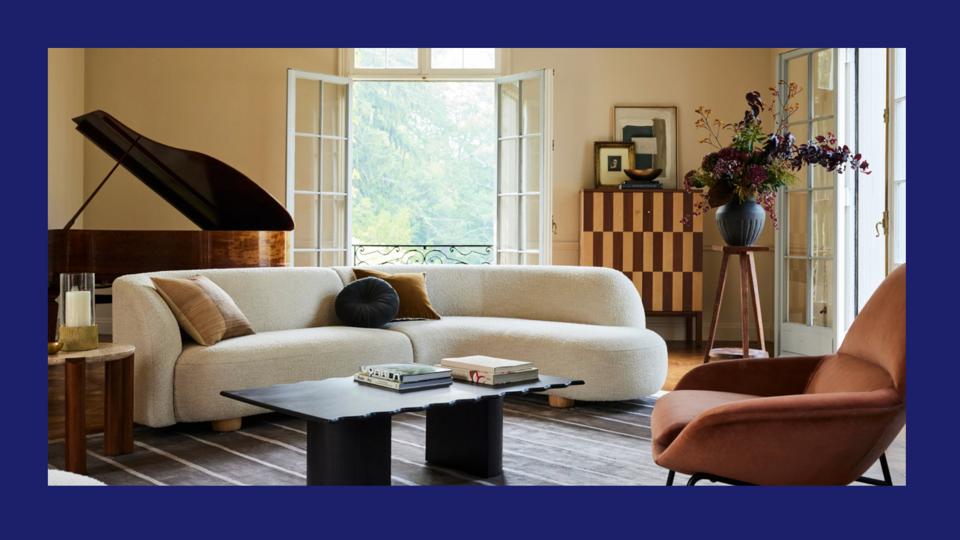 Photo of a living room with all West Elm furniture, including a sofa, chair, coffee table.