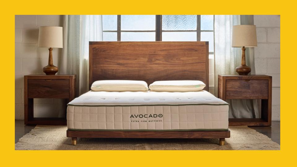 Lifestyle image of the Avocado Extra Firm Mattress in a bedroom.