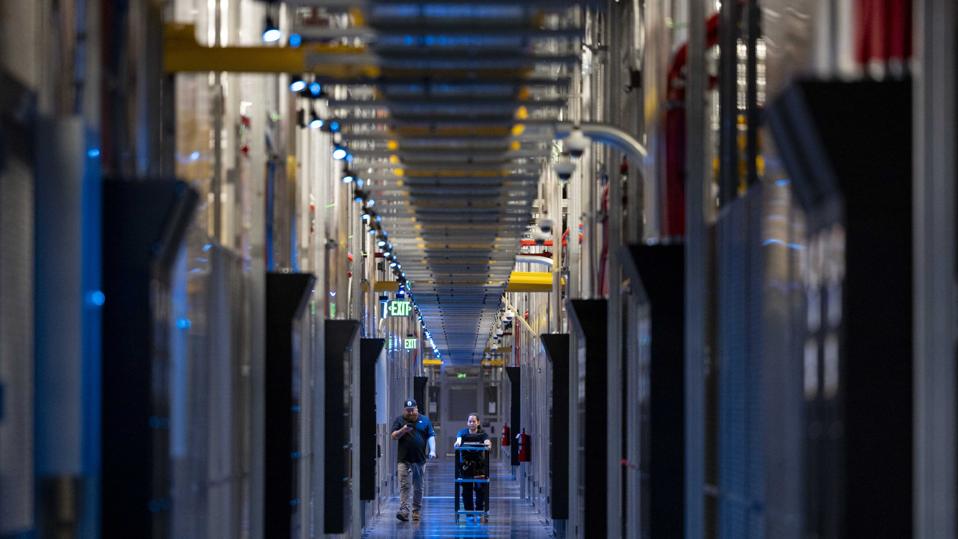 An AI data center representing the best growth stocks to buy for November 2025.
