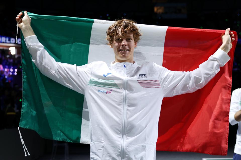 Jannik Sinner celebrates winning the Davis Cup in 2023 after beating Alex de Minaur.
