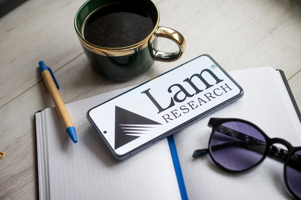 In this photo illustration a Lam Research logo seen...