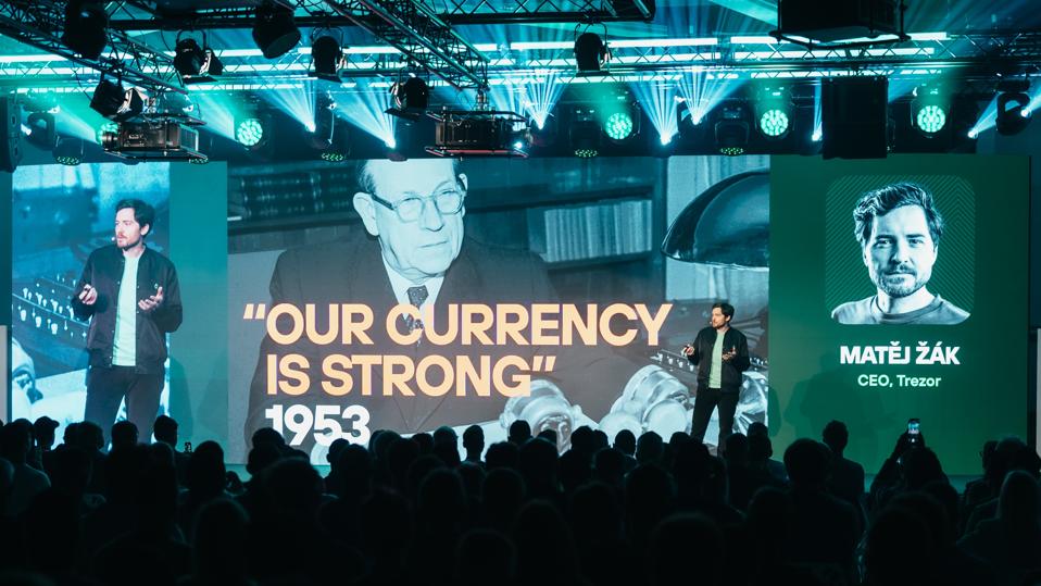 Trezor CEO Matěj Žák on stage at the Trustless by Design conference in Prague