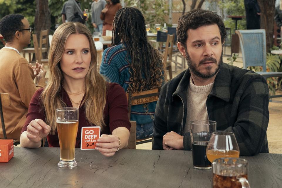 A woman and a man sitting at a table