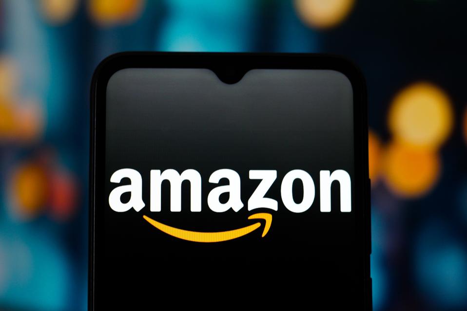 In this photo illustration, the Amazon logo is seen...