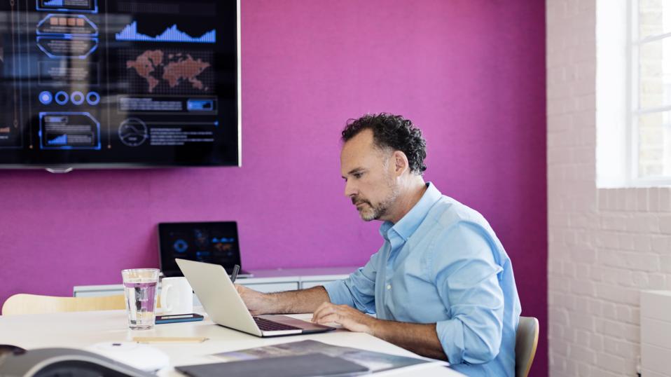 Businessman using ChatGPT to study high-income skills fast