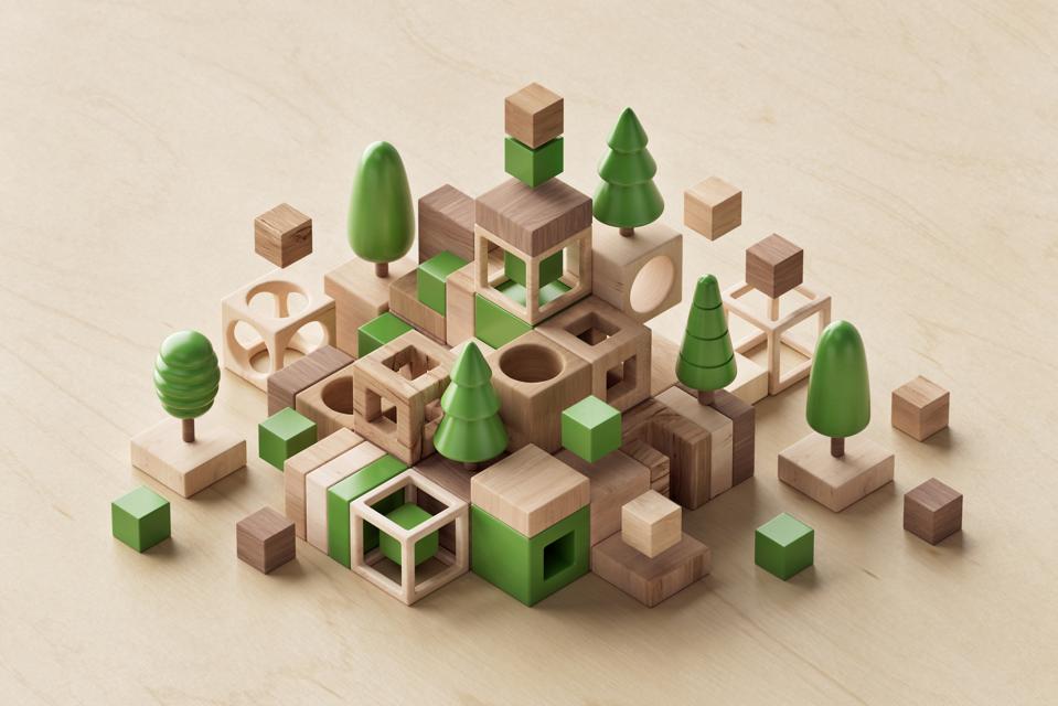 Digitally generated image of wooden abstract cubes and trees. The concept of ESG, sustainability and responsible business.
