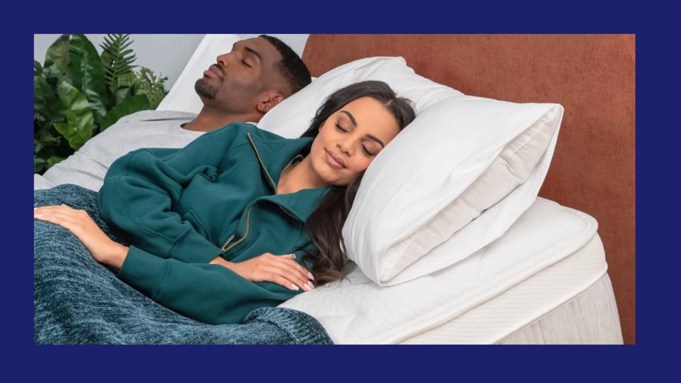 Woman and man sleeping on a Leesa mattress and base.