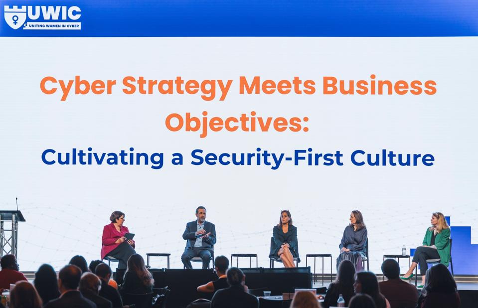 Panelists on a stage