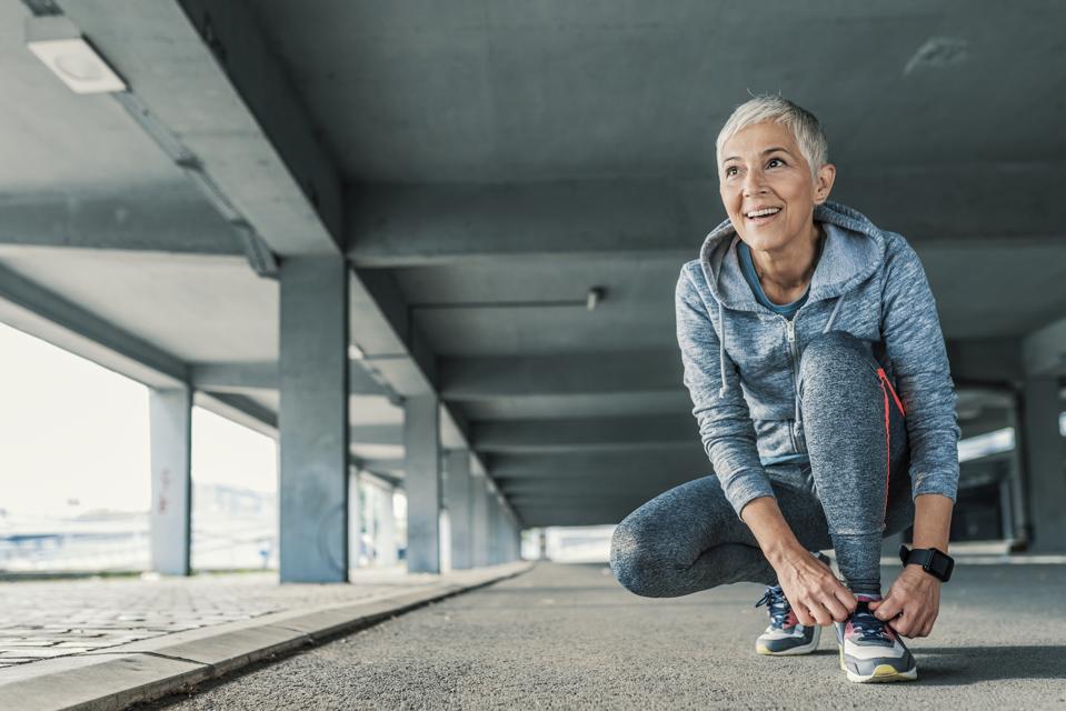 Middle-aged woman getting ready for a run.