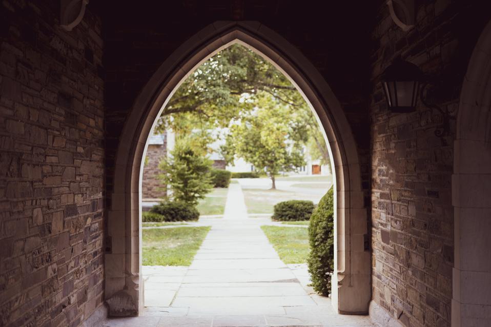 arch tunnel passage on gothic style college campus