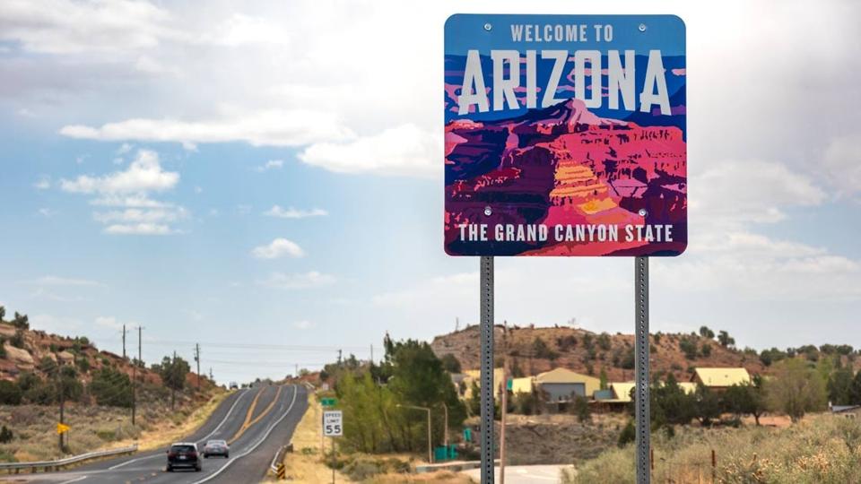 A highway and a billboard in Arizona.