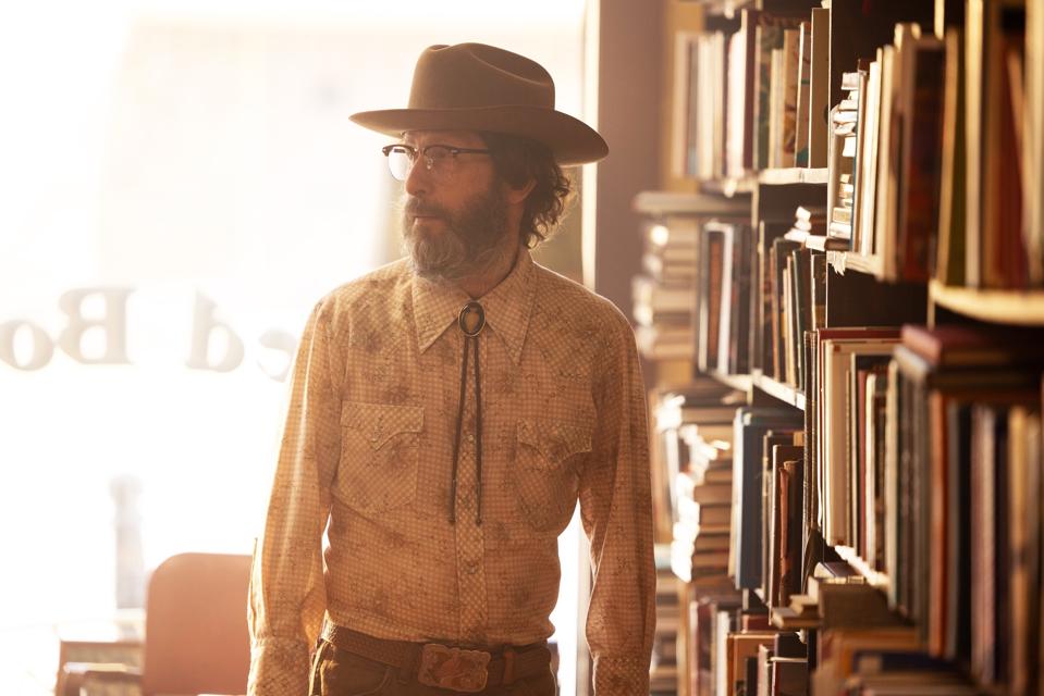 Ethan Hawke as Lee Raybon inside Hoot Owl Books Ethan Hawke in character as Lee Raybon inside his Tulsa bookstore