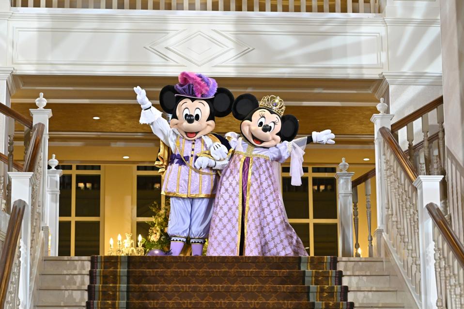 Mickey Mouse and Minnie Mouse perform in the Royal Ball lobby during the Disneyland Hotel reopening celebration at Disneyland Paris on February 03, 2024 in Paris, France.