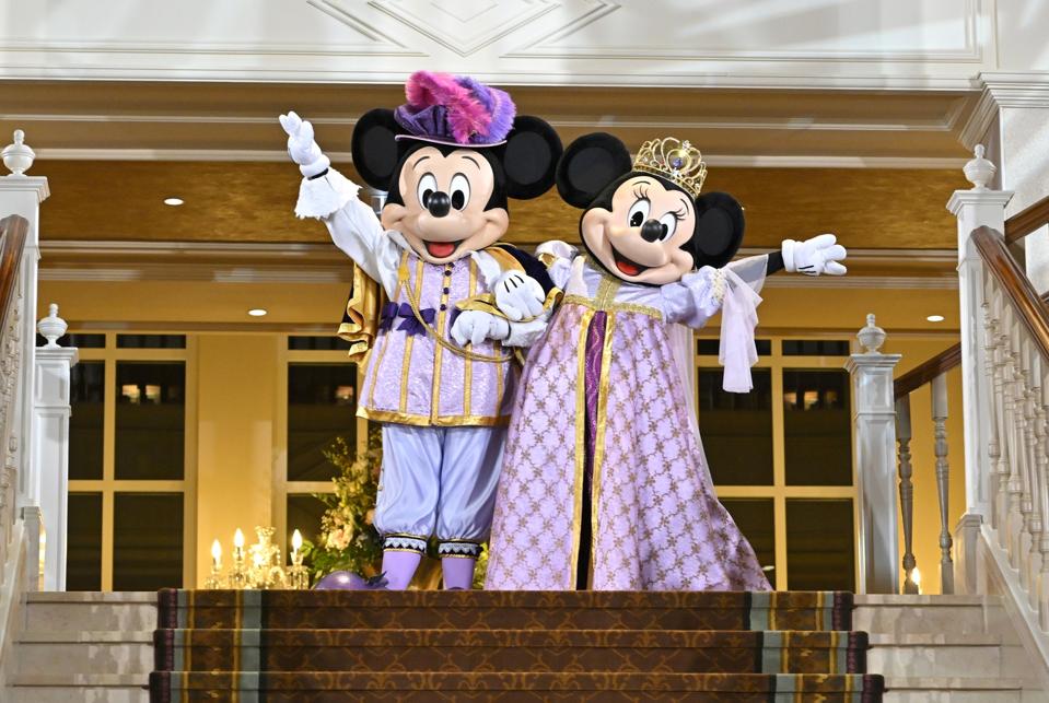 Mickey Mouse and Minnie Mouse perform in the Royal Ball lobby during the Disneyland Hotel reopening celebration at Disneyland Paris on February 03, 2024 in Paris, France.
